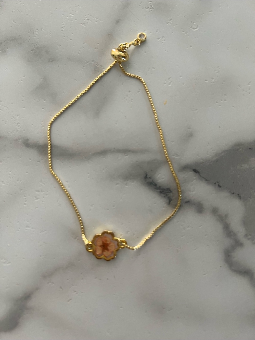 Gold-Tone Bracelet with Pink Flower Charm